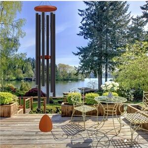 Wood and Metal wind chimes approx 25” long